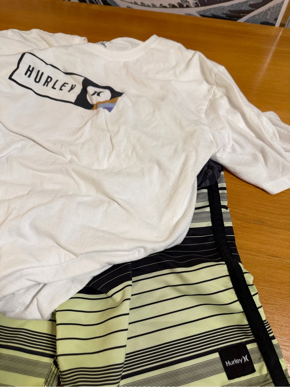 Hurley White Logo T‑Shirt with Light Green and Black Striped Boardshorts